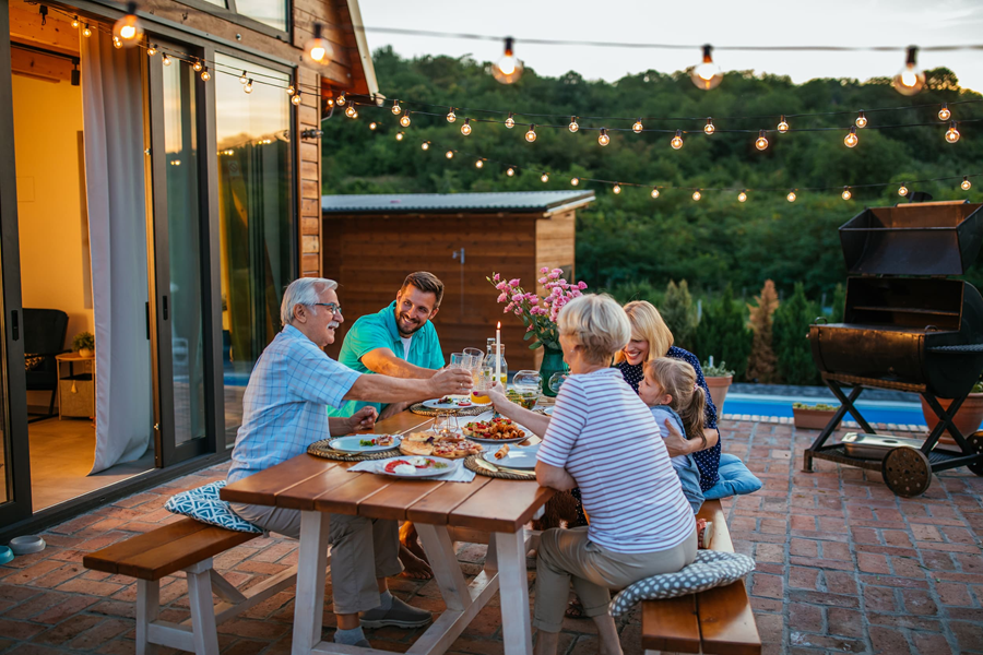 A multi-generational family get-together on a warm summer’s evening.